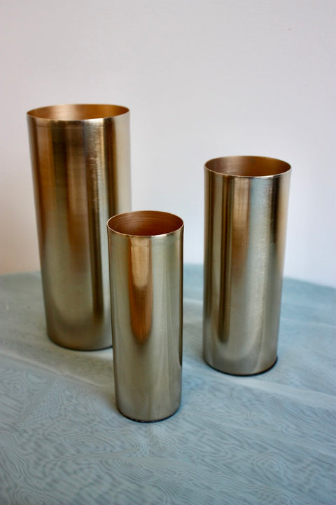 Gold cylinder vase trio