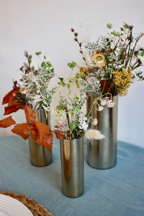Gold cylinder vase trio