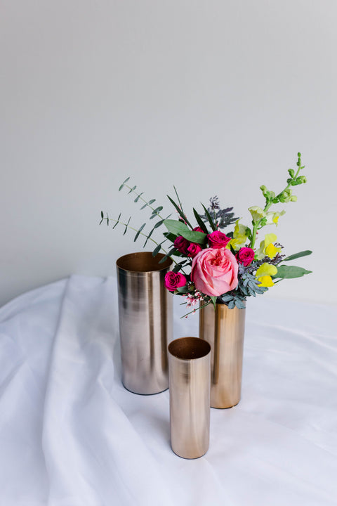 Gold cylinder vase trio